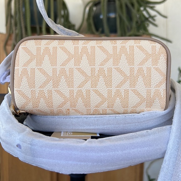 29. Michael Kors Signature Rhea Zip XS Backpack - Picture 10 of 10